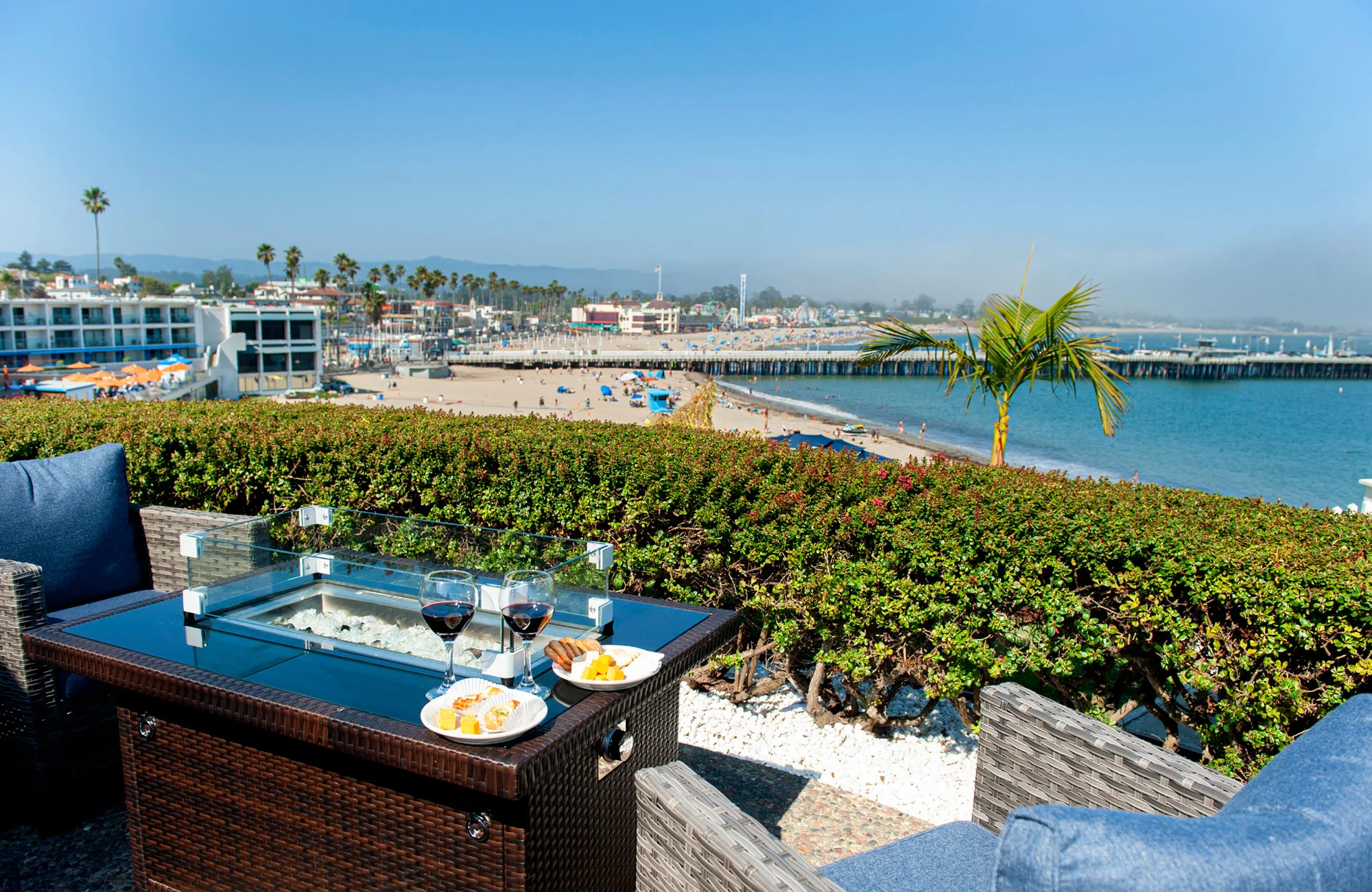 Sea & Sand Inn Patio with wine